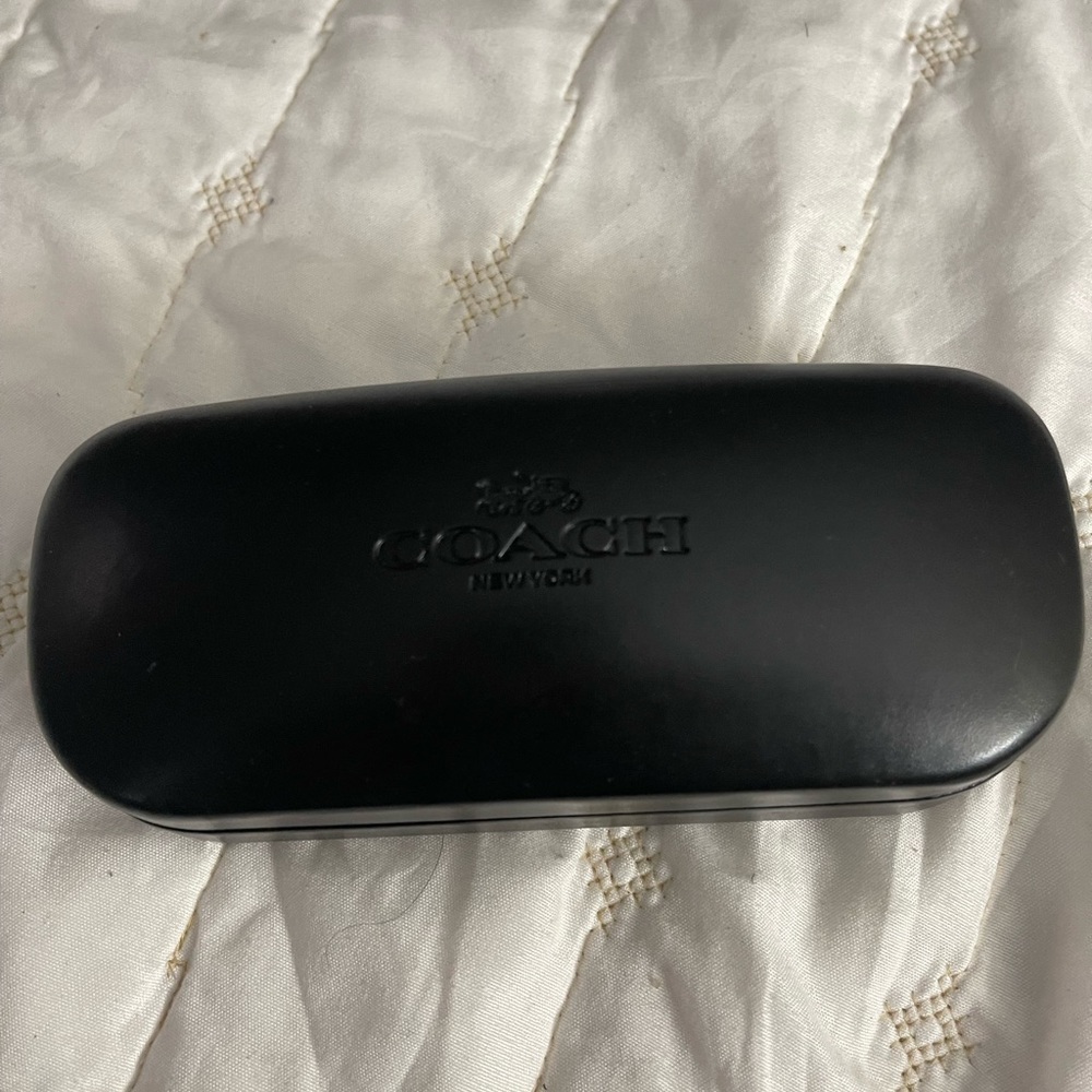 Coach eyeglass case. Some wear. In good condition.